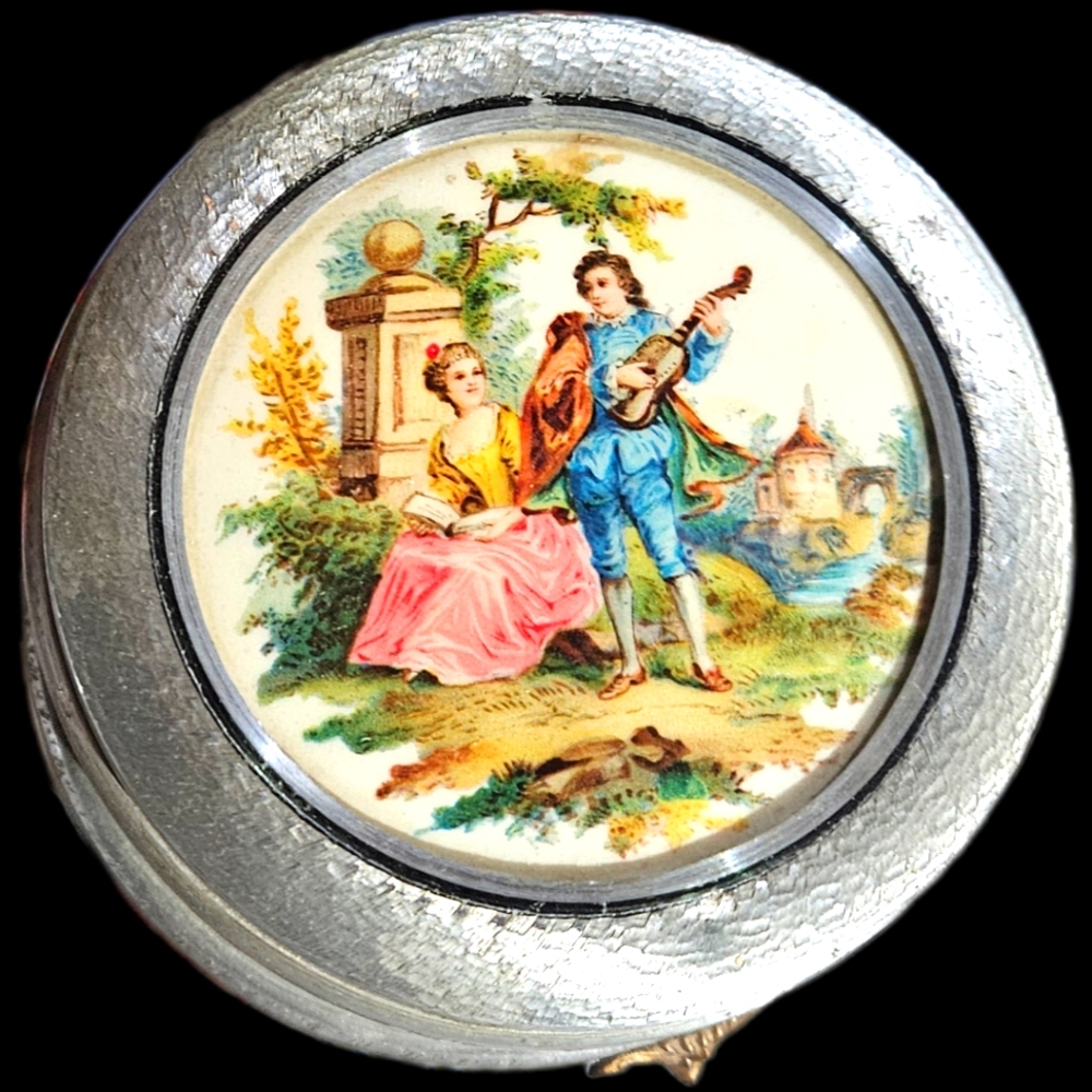 Vintage powder puff music box.